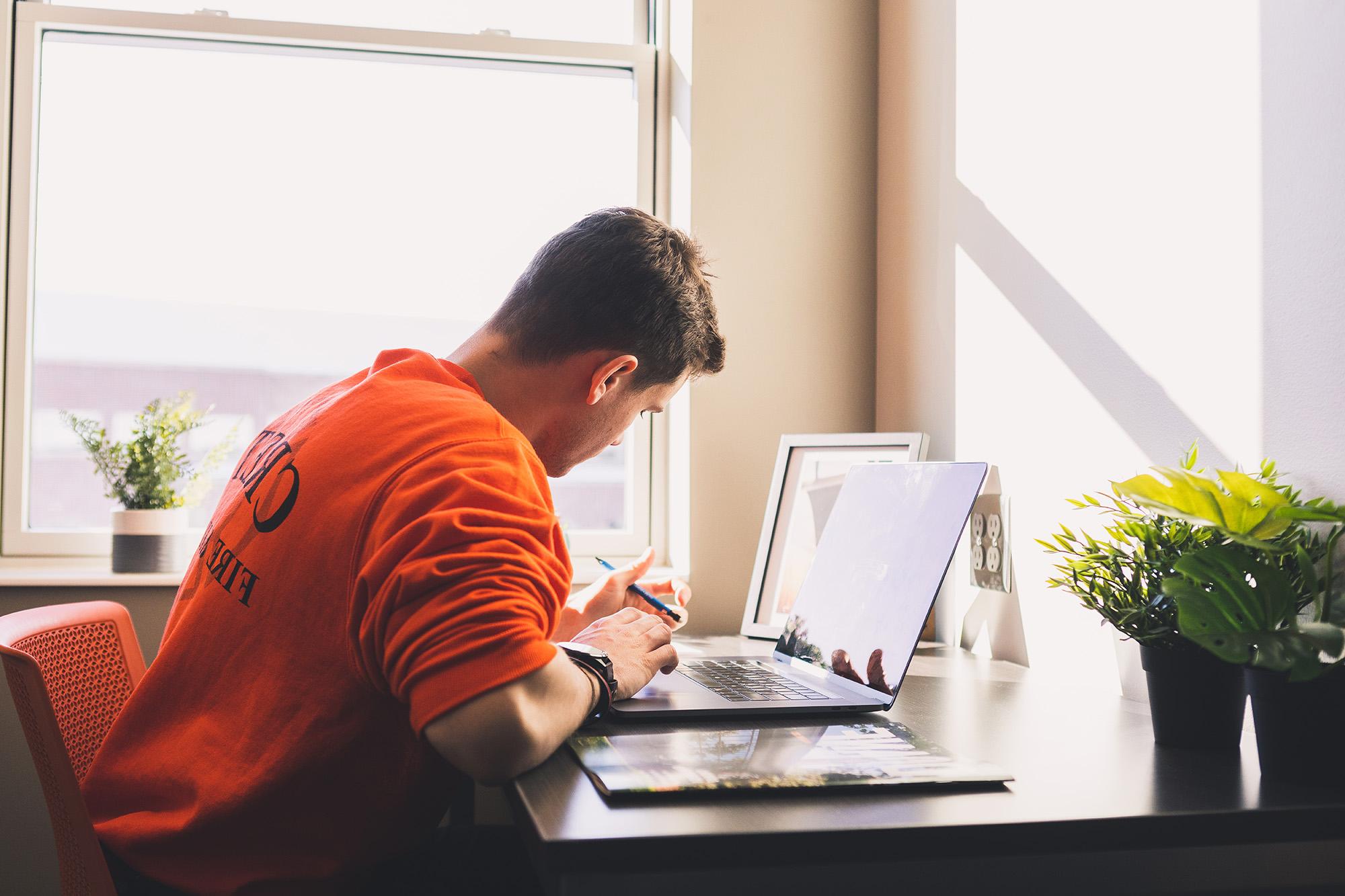 Doane student studying in Brodie Hall